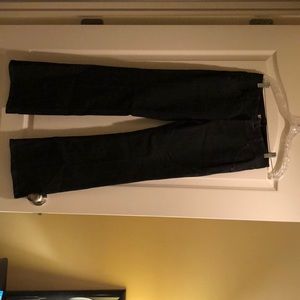 Dark wash CABI wide leg jeans.